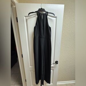 Banana Republic black jumpsuit 
NWT
Size 4